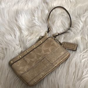 Small gold wristlet from Coach!